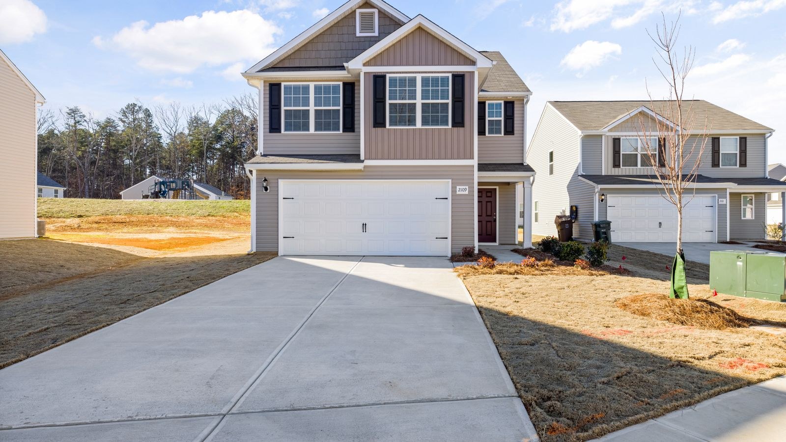 Driveway leading to a suburban house